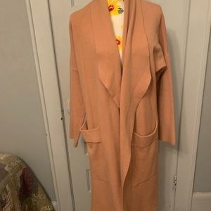 Beautiful sweater coat size large camel color. In excellent used condition.